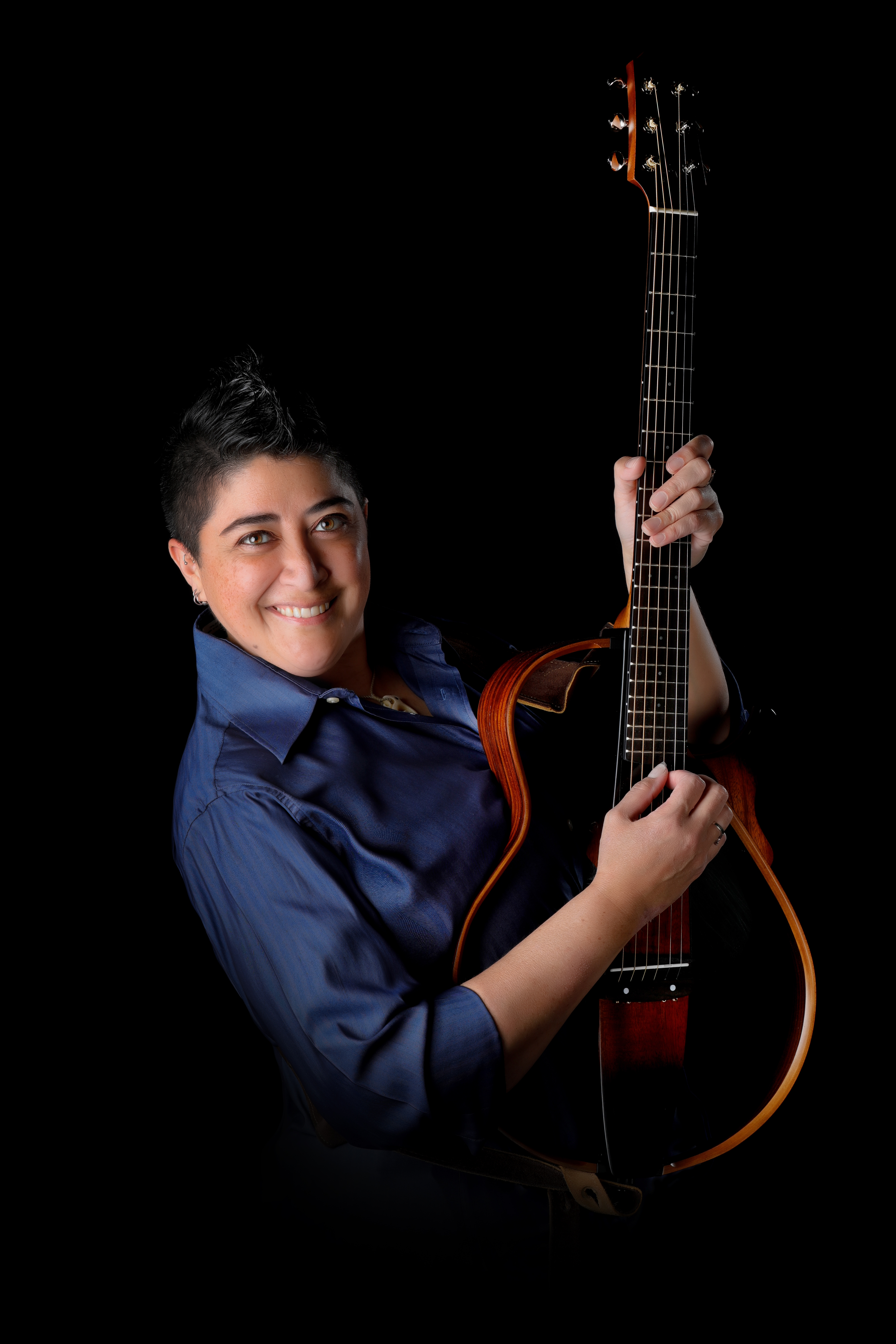 B.J. O'Shea with guitar